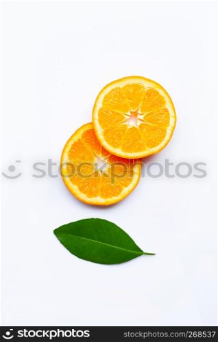 Fresh orange citrus fruit with leave on white background. Top view