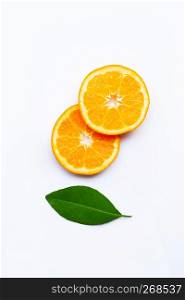 Fresh orange citrus fruit with leave on white background. Top view