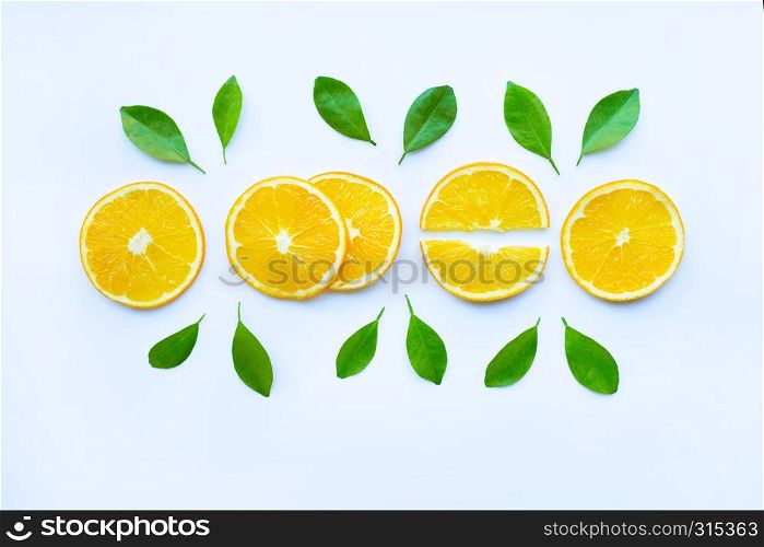 Fresh orange citrus fruit with leaves isolated on white background