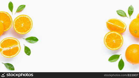 Fresh orange citrus fruit with leaves isolated on white background. Juicy and sweet with copy space