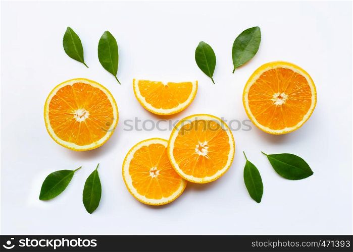 Fresh orange citrus fruit with leaves on white background