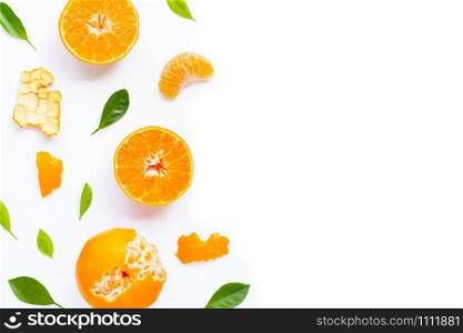 Fresh orange citrus fruit with leaves on white background. Juicy, sweet and high vitamin C