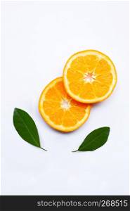 Fresh orange citrus fruits with leaves on white background. Top view