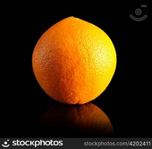 fresh orange , close up on black background
