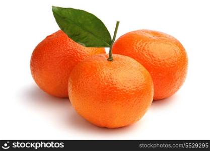 Fresh orange fruit with leaf isolated on white background
