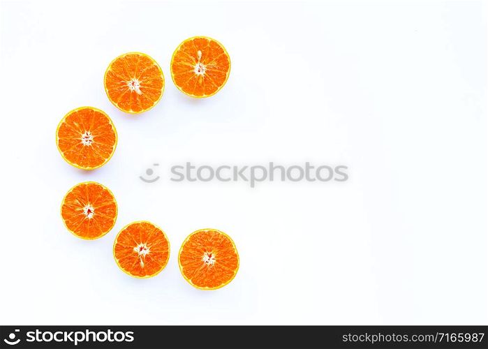 Fresh orange, High vitamin C, Letter C made of citrus fruits on white background. Copy space