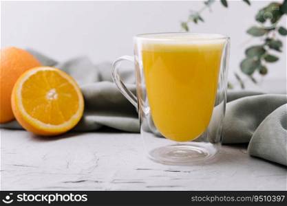 fresh orange juice glass on stone