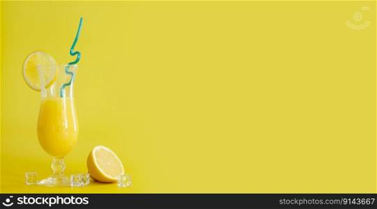 Fresh orange juice in glass, decorated with slice of lemon and blue straw. Summer cocktail on the yellow background. Colorful template. Free space for text, copy space. Fresh orange juice in glass, decorated with slice of lemon and blue straw. Summer cocktail on the yellow background. Colorful template. Free space for text, copy space.