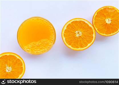 Fresh orange juice with orange fruit on white background. Copy space