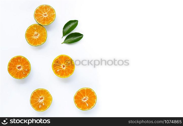 Fresh orange on white background. Copy space
