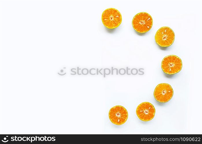 Fresh orange on white background. Copy space