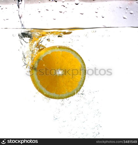 fresh orange water splash healthy concept