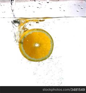 fresh orange water splash healthy concept