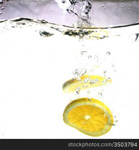 fresh orange water splash healthy concept
