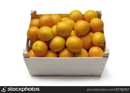 Fresh oranges in a container on white background