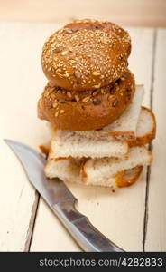 fresh organic bread over rustic table macro closeup