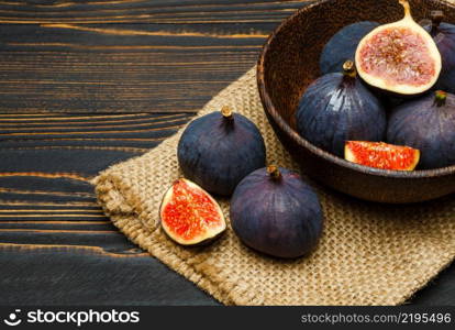 Fresh Organic Fig isolated on wooden background. Fig isolated on wooden background