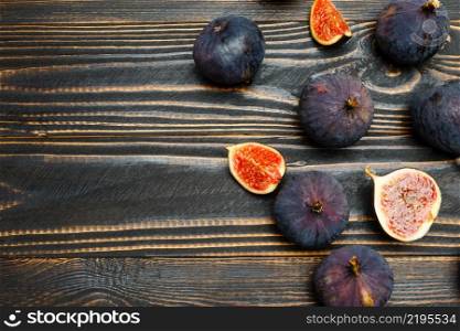 Fresh Organic Figs on wooden background or table. Figs on wooden background