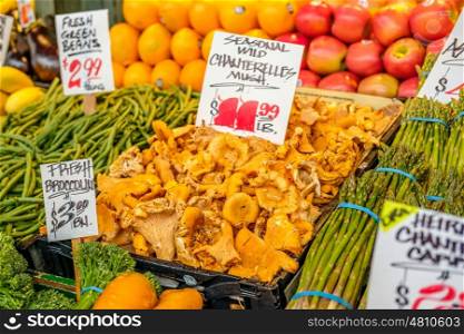 Fresh organic mushrooms, fruits and vegetables at farmers marketplace