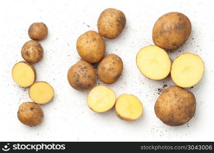 Fresh organic potatoes isolated on white background. Top view. Fresh Organic Potatoes Isolated on White Background