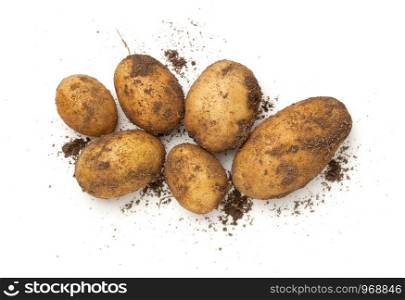 Fresh organic potatoes isolated on white background. Top view, flat lay
