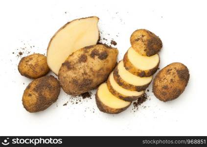 Fresh organic potatoes isolated on white background. Top view, flat lay