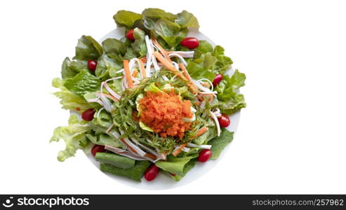 fresh organic salad with fish roe and crab stick on white plate. fresh organic salad