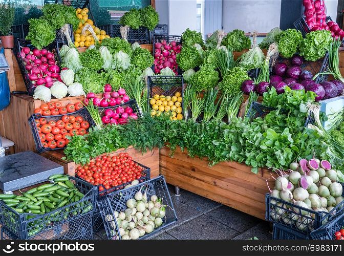 Fresh organic vegetables for sale at greengrocer shop.