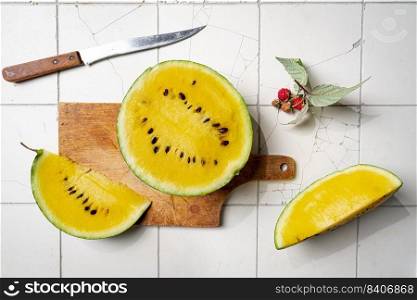 Fresh organic watermelon with a slices on white background with natural light, top view. Fresh organic watermelon