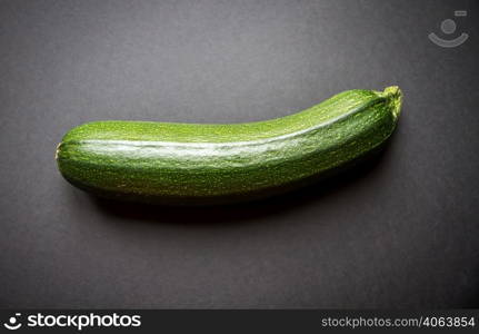 Fresh organic zucchini isolated on a black background. Zucchini isolated on a black background