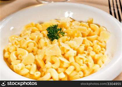 fresh original american style macaroni and cheese with parsley on top ,tipycal american food