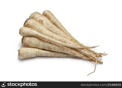 Fresh parsley roots on white background