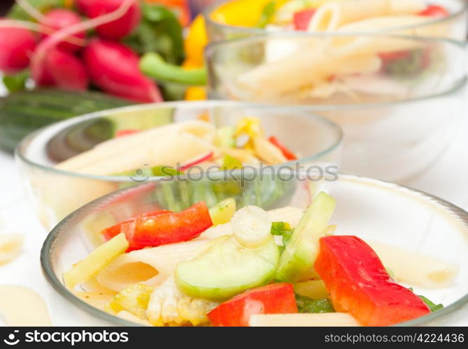 Fresh Pasta Salad With Tomatoes, Pepper, Cucumber, Radish and Lettuce