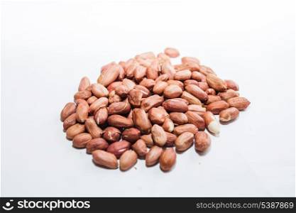fresh peanuts on white background