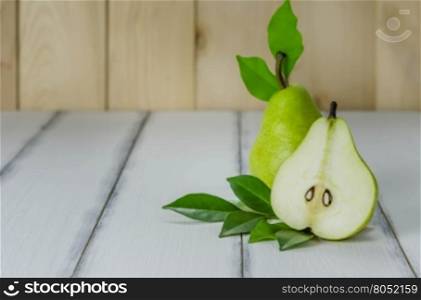 Fresh pears on the wooden background , Free space for text