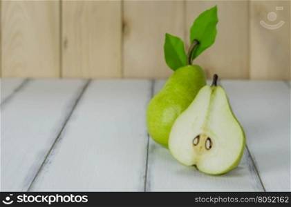 Fresh pears on the wooden background , Free space for text