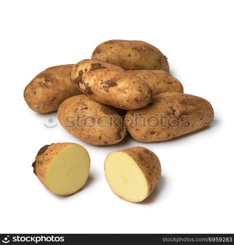 Fresh picked raw whole and sliced Diamant potatoes from Cyprus isolated on white background. Fresh picked raw whole and sliced Diamant potatoes from Cyprus