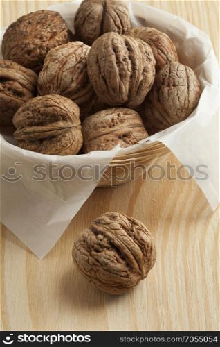 Fresh picked wet walnuts in a basket