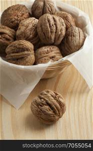 Fresh picked wet walnuts in a basket