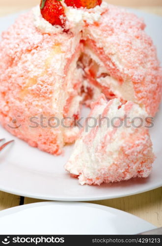 fresh pink strawberry and whipped cream dessert macro close up