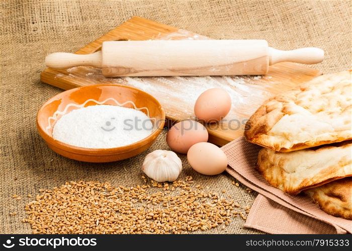 fresh pita bread isolated on sacking background