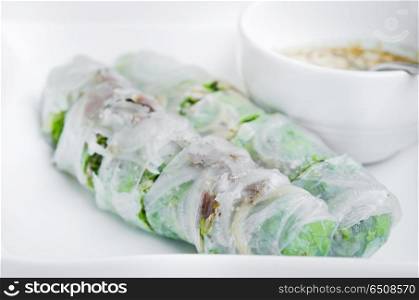 Fresh pork spring rolls with herbs and sweet sauce