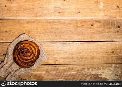 Fresh puff pastry on wooden table. Coffee, food and breakfast concept. Desserts, fresh pastries, biscuits and coffee. Top view and copy space. Fresh puff pastry on wooden table. Coffee, food and breakfast concept. Desserts, fresh pastries, biscuits and coffee. Top view and copy space