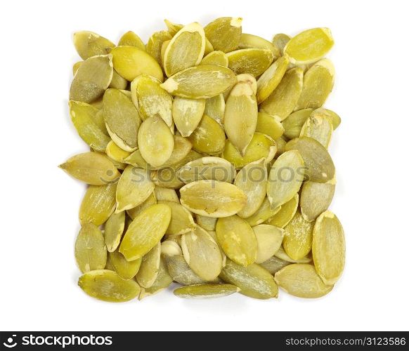 fresh pumpkin seeds isolated on a white