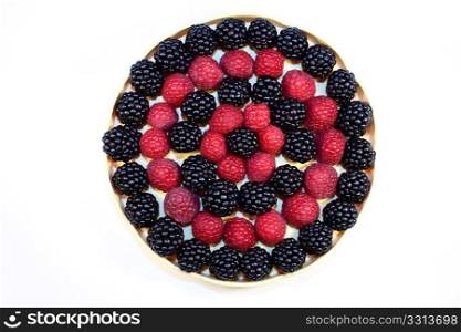 Fresh raspberries and blackberries in a little dish, ordered in a circle