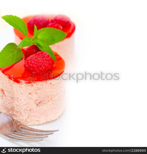 fresh raspberry cake mousse dessert round shape with mint leaves