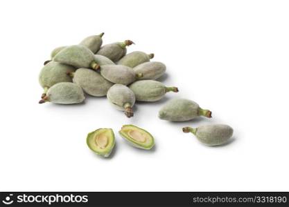 Fresh raw green bitter almonds in the pod