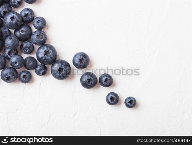 Fresh raw organic blueberries on white background.