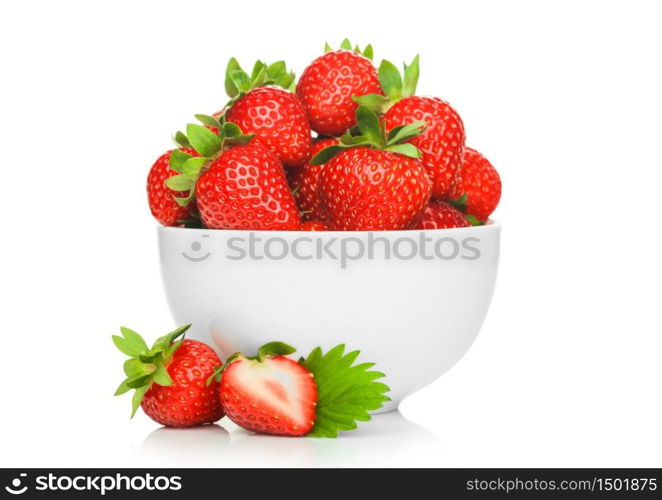 Fresh raw organic strawberries in white ceramic bowl plate on white background with berries next to it. Macro