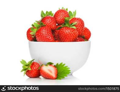 Fresh raw organic strawberries in white ceramic bowl plate on white background with berries next to it. Macro